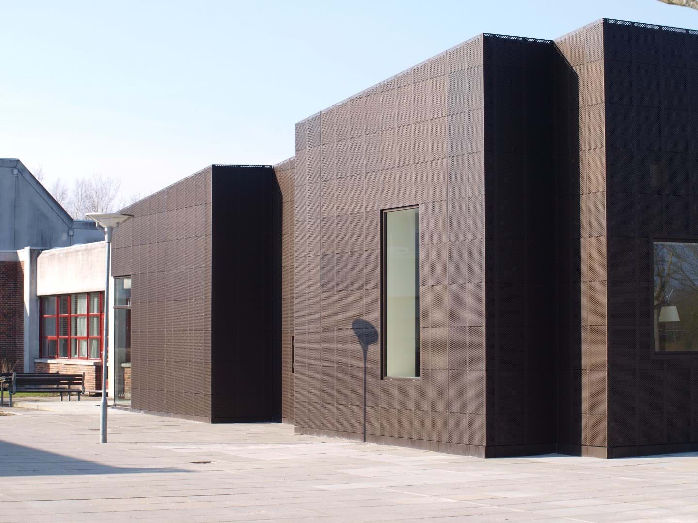 Allerød Allerød High School with facade made of perforated aluminium plates.